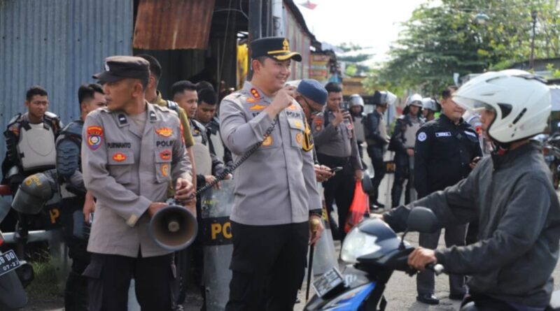 Jaga Kondusifitas Wilayah, Kapolres Magetan Pimpin Langsung Pengamanan Massa di Madigondo Perbatasan Magetan–Madiun